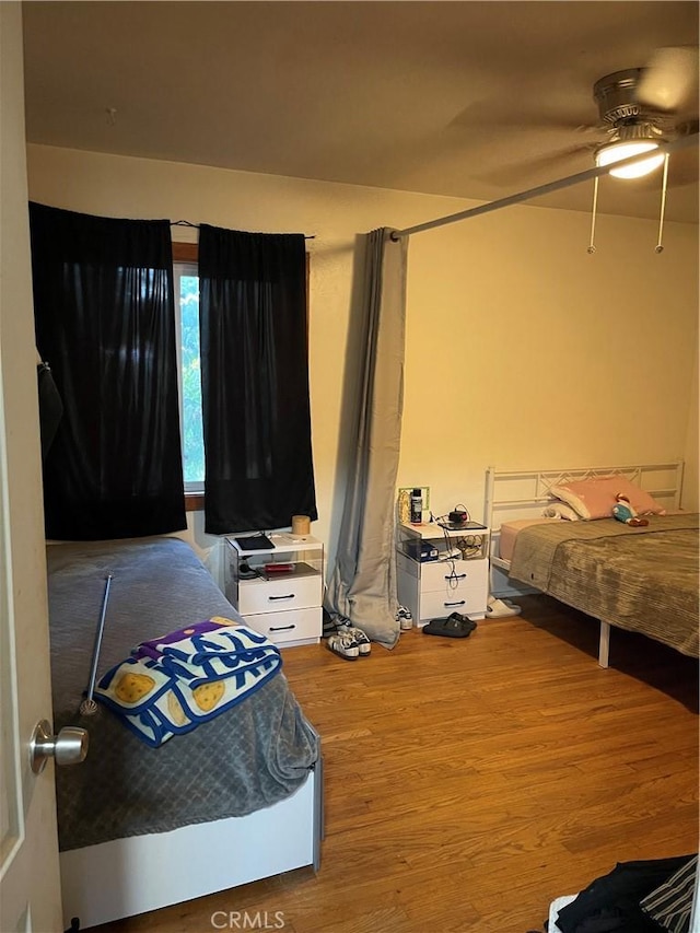 537 Drakeley Ave, Atwater, CA 95301 - bedroom with wood finished floors and a ceiling fan