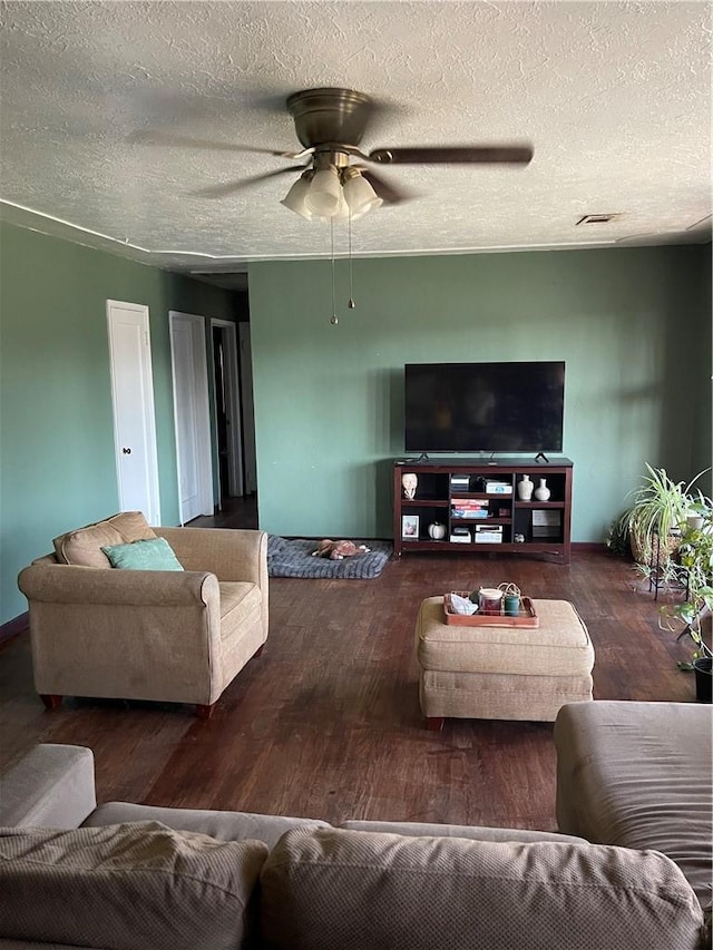 537 Drakeley Ave, Atwater, CA 95301 - living area with wood finished floors, a ceiling fan, and a textured ceiling