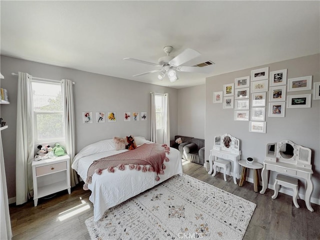 5834 Gem Ct, Lancaster, CA 93536 - bedroom featuring wood finished floors and a ceiling fan