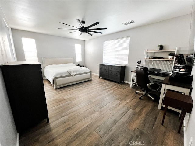 5834 Gem Ct, Lancaster, CA 93536 - bedroom featuring wood finished floors, a desk, and a ceiling fan