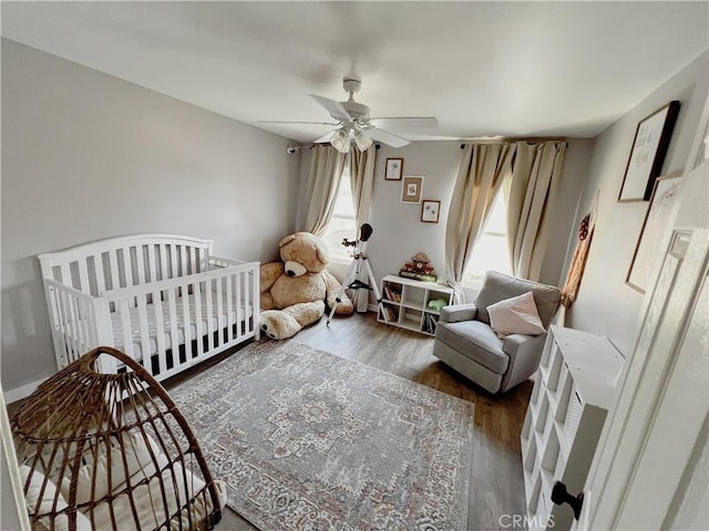 5834 Gem Ct, Lancaster, CA 93536 - bedroom with wood finished floors and ceiling fan