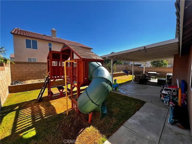5834 Gem Ct, Lancaster, CA 93536 - view of jungle gym featuring a fenced backyard and a patio