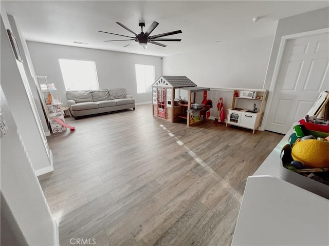 5834 Gem Ct, Lancaster, CA 93536 - game room featuring ceiling fan and wood finished floors