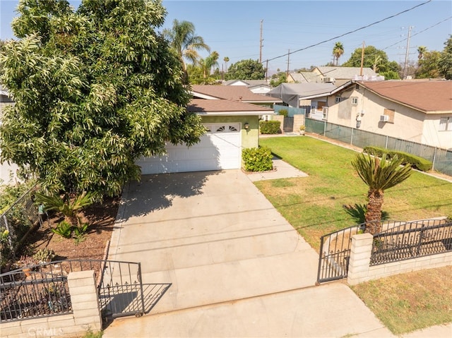 3133 Juanita St, Riverside, CA 92504 - view of front of home with concrete driveway, a gate, and a garage