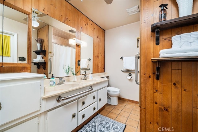 3133 Juanita St, Riverside, CA 92504 - full bathroom with tile patterned flooring, double vanity, curtained shower, and ceiling fan