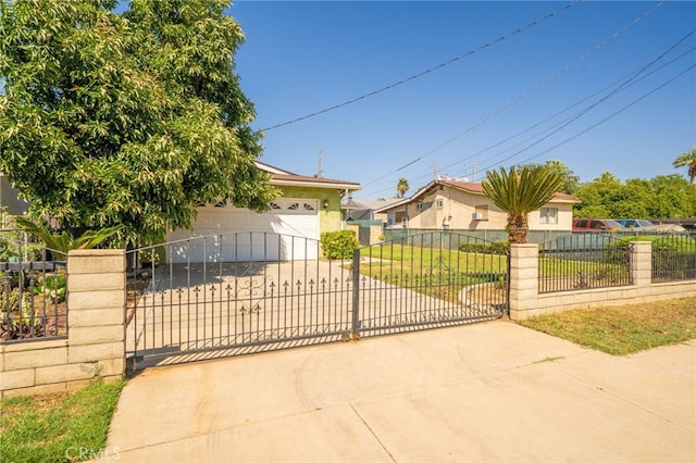 3133 Juanita St, Riverside, CA 92504 - view of property hidden behind natural elements featuring concrete driveway and a gate