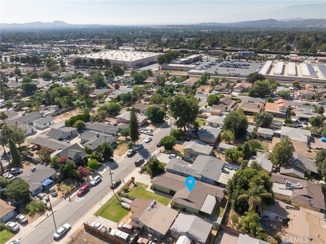 3133 Juanita St, Riverside, CA 92504 - aerial view of property and surrounding area featuring a mountain backdrop and nearby suburban area