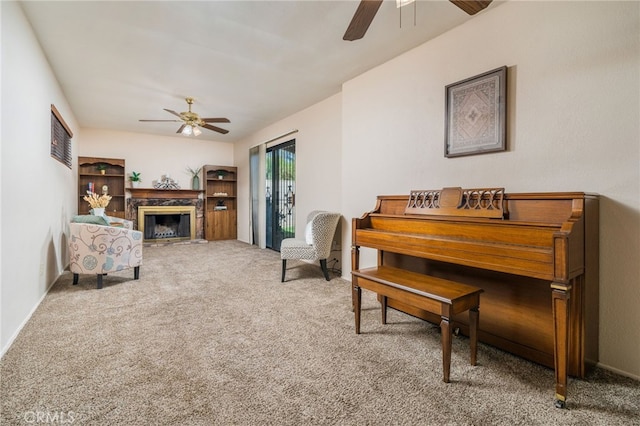 3133 Juanita St, Riverside, CA 92504 - living room with a ceiling fan, carpet flooring, and a high end fireplace