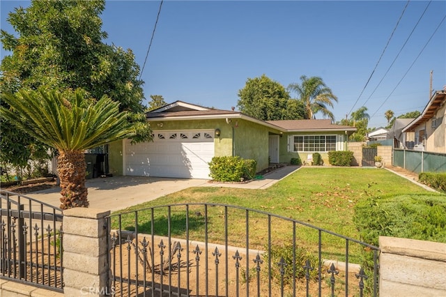 3133 Juanita St, Riverside, CA 92504 - ranch-style home with a garage, concrete driveway, a fenced front yard, and stucco siding