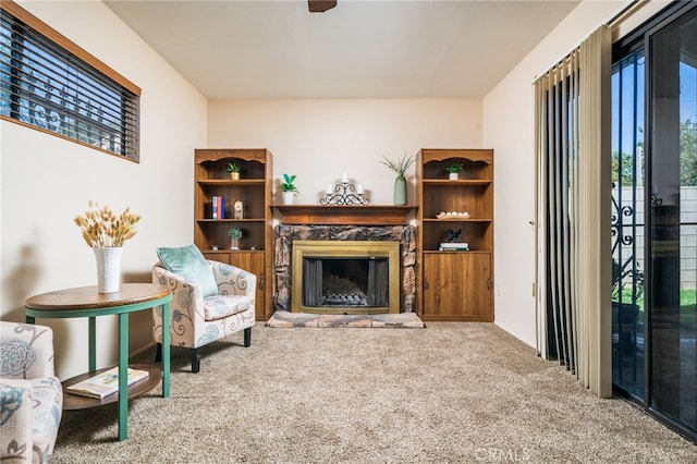 3133 Juanita St, Riverside, CA 92504 - sitting room with carpet floors and a stone fireplace