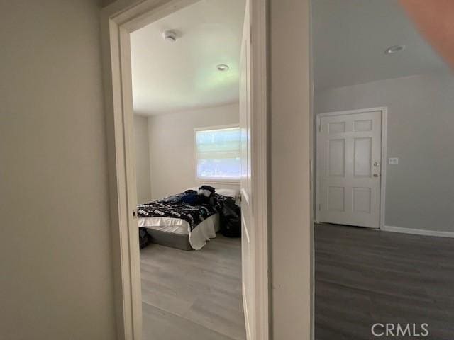 840 W 27th St, San Bernardino, CA 92405 - hall with wood finished floors and baseboards