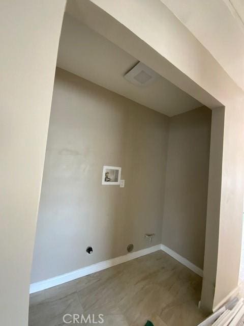840 W 27th St, San Bernardino, CA 92405 - laundry area with hookup for a washing machine and baseboards