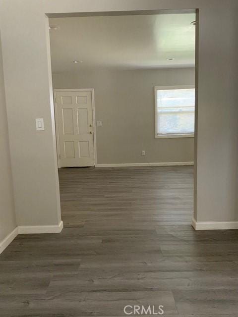 840 W 27th St, San Bernardino, CA 92405 - spare room featuring wood finished floors