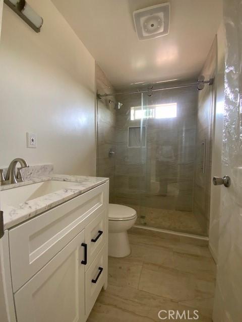 840 W 27th St, San Bernardino, CA 92405 - full bath featuring vanity and a tile shower