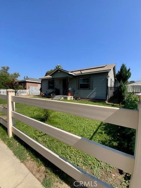 840 W 27th St, San Bernardino, CA 92405 - view of front of house featuring solar panels