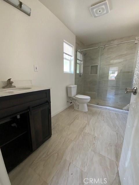 840 W 27th St, San Bernardino, CA 92405 - full bathroom featuring tiled shower, vanity, and marble look tiles