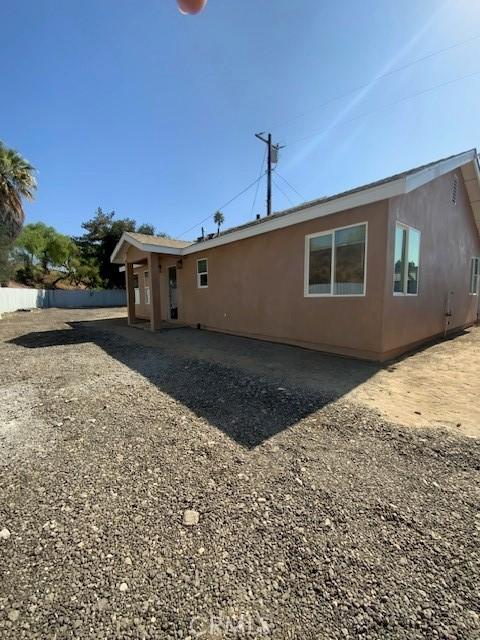 840 W 27th St, San Bernardino, CA 92405 - back of house with stucco siding