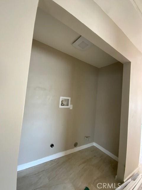 840 W 27th St, San Bernardino, CA 92405 - laundry room featuring hookup for a washing machine and baseboards