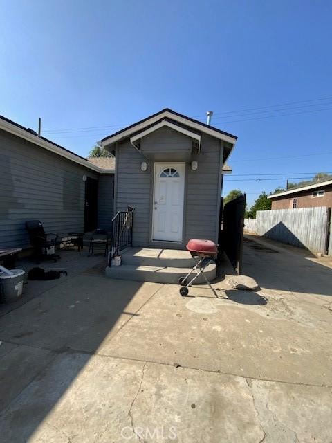 840 W 27th St, San Bernardino, CA 92405 - property entrance with a patio