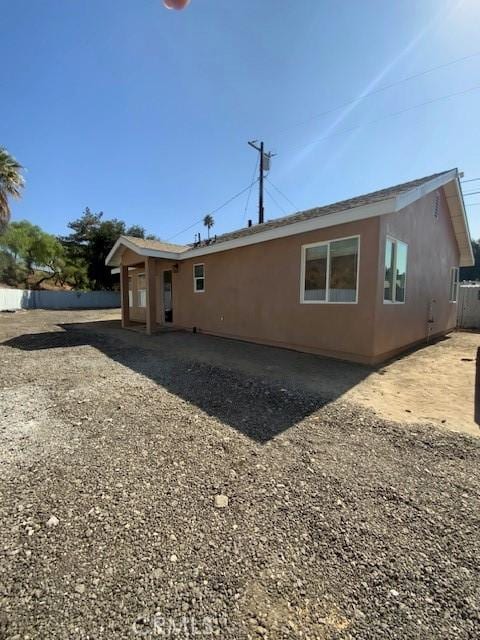 840 W 27th St, San Bernardino, CA 92405 - back of property featuring stucco siding