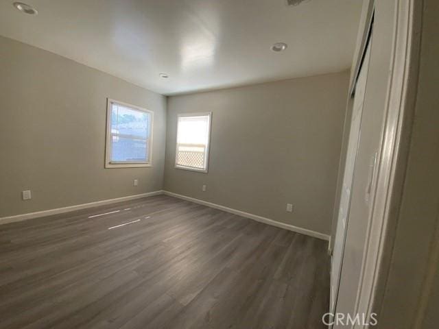 840 W 27th St, San Bernardino, CA 92405 - unfurnished room with dark wood finished floors and recessed lighting