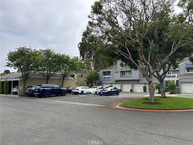 19311 Sunray Ln Unit 104, Huntington Beach, CA 92648 - view of front of property featuring uncovered parking
