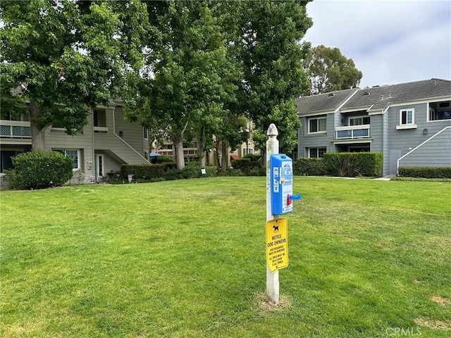 19311 Sunray Ln Unit 104, Huntington Beach, CA 92648 - view of community with a yard