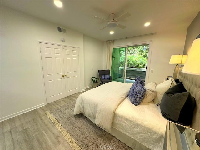19311 Sunray Ln Unit 104, Huntington Beach, CA 92648 - bedroom with access to outside, wood finished floors, recessed lighting, a ceiling fan, and a closet