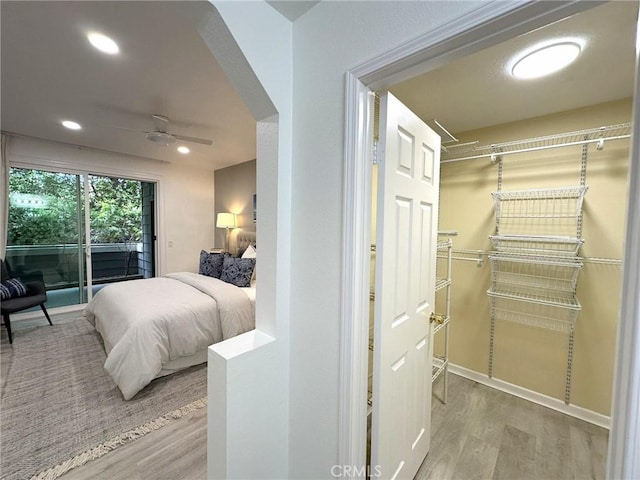 19311 Sunray Ln Unit 104, Huntington Beach, CA 92648 - bedroom featuring wood finished floors, access to outside, and recessed lighting