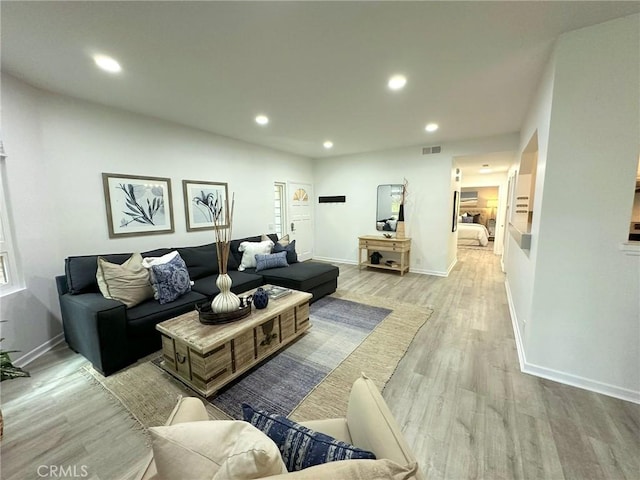 19311 Sunray Ln Unit 104, Huntington Beach, CA 92648 - living area featuring light wood-type flooring and recessed lighting