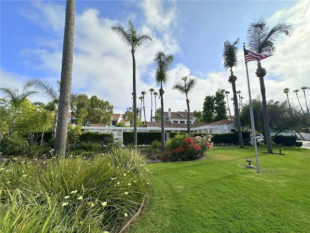 19311 Sunray Ln Unit 104, Huntington Beach, CA 92648 - surrounding community with a yard