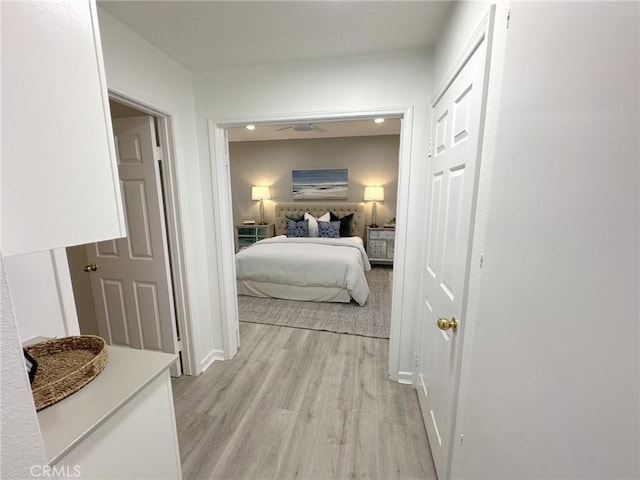 19311 Sunray Ln Unit 104, Huntington Beach, CA 92648 - bedroom with light wood-type flooring and baseboards