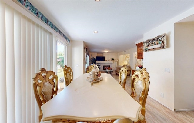 220 S Linhaven Cir, Anaheim, CA 92804 - dining room with a fireplace, light wood finished floors, and recessed lighting