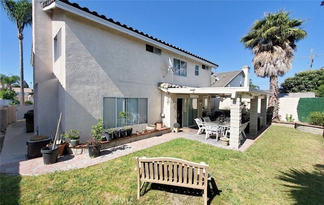 220 S Linhaven Cir, Anaheim, CA 92804 - rear view of property with stucco siding, a patio, a fenced backyard, and a tiled roof