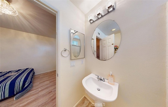 220 S Linhaven Cir, Anaheim, CA 92804 - bathroom with a sink and wood finished floors