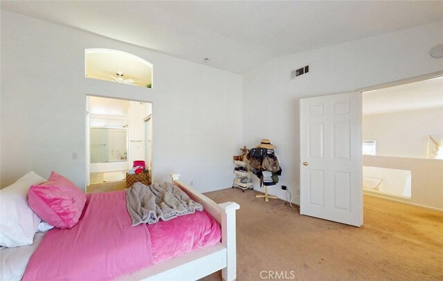 220 S Linhaven Cir, Anaheim, CA 92804 - bedroom with lofted ceiling, carpet flooring, and connected bathroom