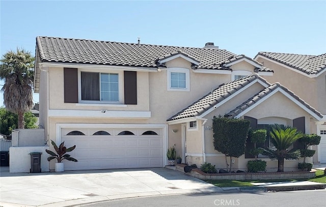 220 S Linhaven Cir, Anaheim, CA 92804 - view of front of house with a tiled roof, stucco siding, an attached garage, driveway, and a chimney