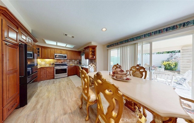 220 S Linhaven Cir, Anaheim, CA 92804 - dining room with light wood finished floors and recessed lighting
