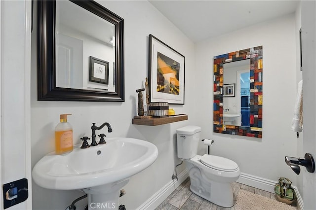 1909 Arroyo Ave, Oceanside, CA 92056 - bathroom featuring baseboards and a sink