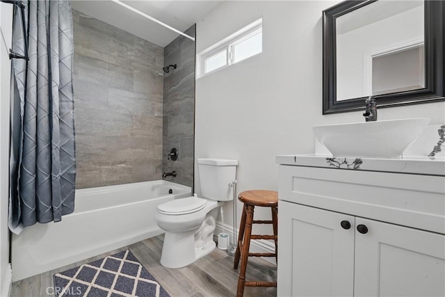 1909 Arroyo Ave, Oceanside, CA 92056 - bathroom with shower / tub combo with curtain, vanity, and wood finished floors