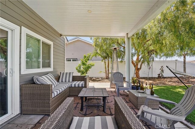 1909 Arroyo Ave, Oceanside, CA 92056 - fenced backyard with an outdoor living space and a patio