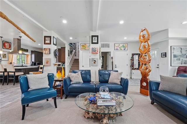1909 Arroyo Ave, Oceanside, CA 92056 - living area with stairs, recessed lighting, beamed ceiling, and light carpet