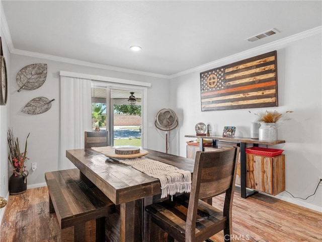 27239 Peach Tree Ln, Helendale, CA 92342 - dining area with ornamental molding and light wood finished floors