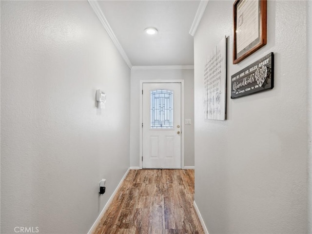27239 Peach Tree Ln, Helendale, CA 92342 - doorway featuring wood finished floors and crown molding