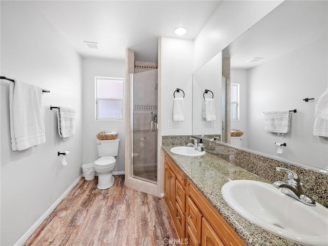 27239 Peach Tree Ln, Helendale, CA 92342 - full bathroom with a shower stall, double vanity, and wood finished floors
