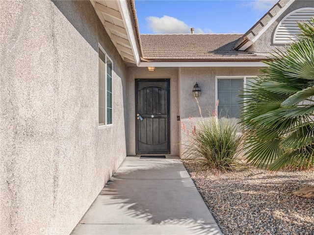 27239 Peach Tree Ln, Helendale, CA 92342 - entrance to property with stucco siding and a tiled roof