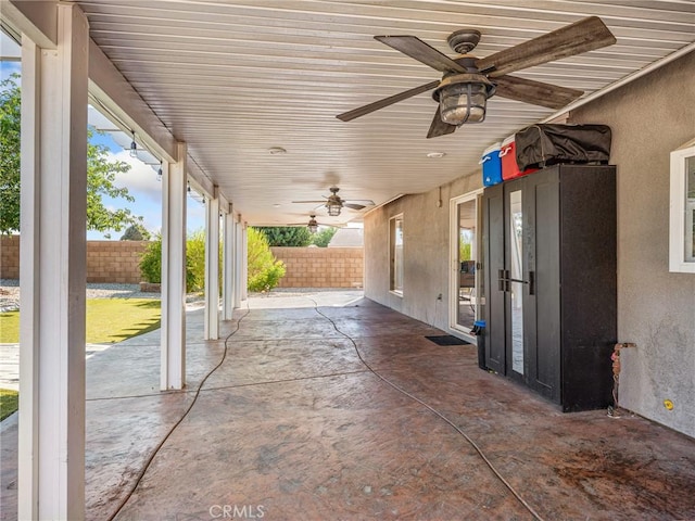 27239 Peach Tree Ln, Helendale, CA 92342 - fenced backyard with ceiling fan and a patio