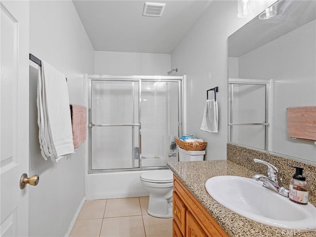 27239 Peach Tree Ln, Helendale, CA 92342 - bathroom featuring tile patterned floors, vanity, and shower / bath combination with glass door