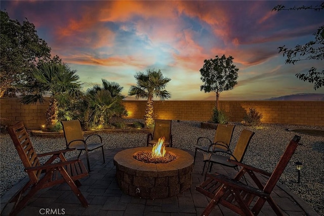 27239 Peach Tree Ln, Helendale, CA 92342 - fenced backyard with an outdoor fire pit and a patio