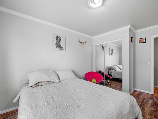 27239 Peach Tree Ln, Helendale, CA 92342 - bedroom with crown molding, wood finished floors, and a closet